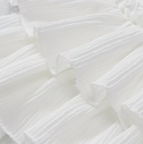 Biała elegancka mini spódniczka z falbanami Rozmiar M