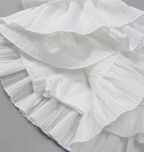 Biała elegancka mini spódniczka z falbanami Rozmiar M